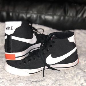 NIKE black and white high tops